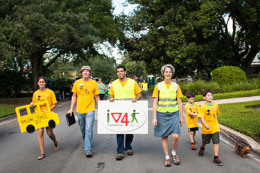 Volunteers walking with children