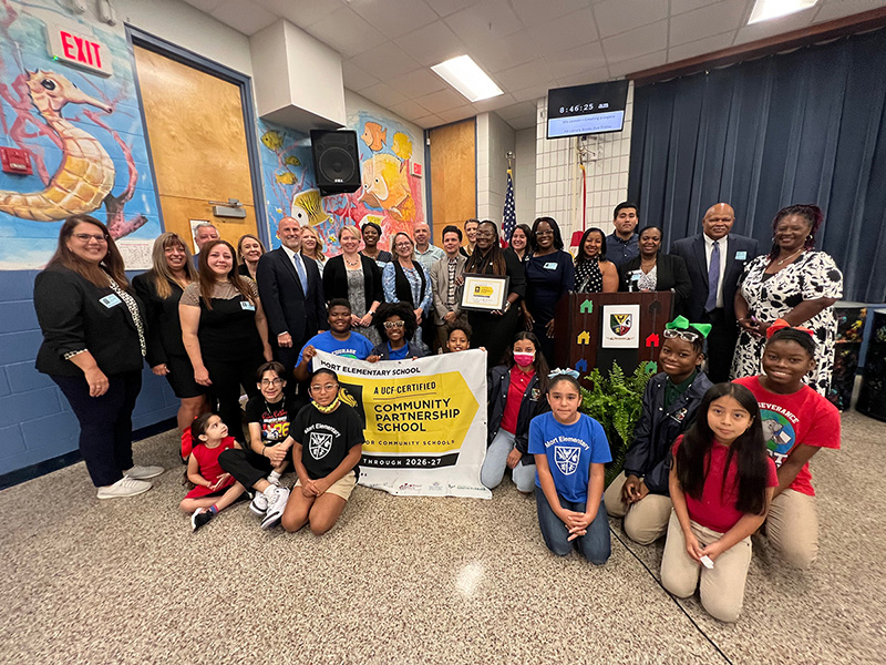 center for community schools staff with children