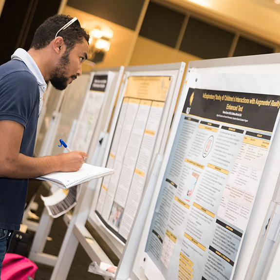 Student at Research Showcase event