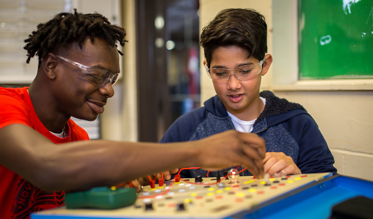 student working with child