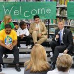 group photo and welcome sign