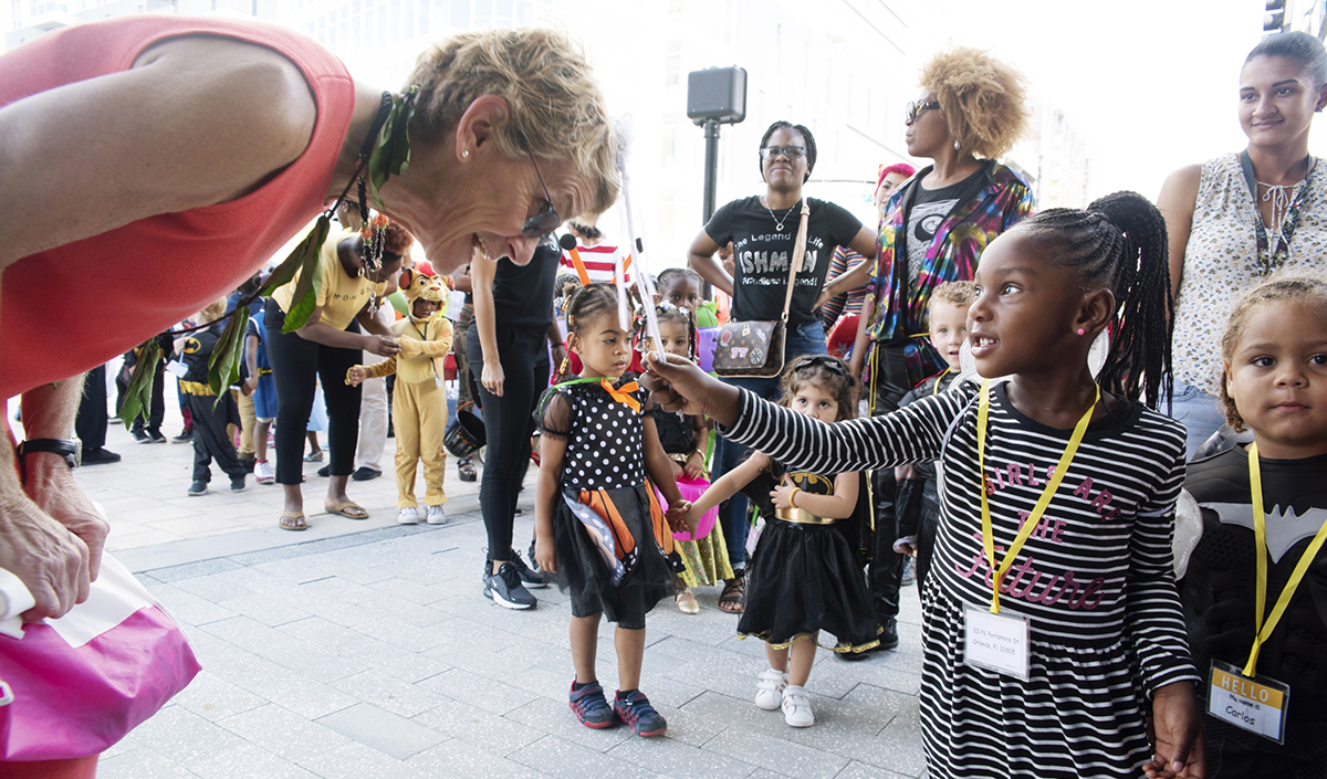 Dean Carroll with children in costumes