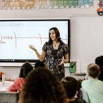 teacher and children in school