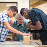 students learning woodwork