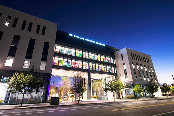 UCF DOwntown building lit up at night