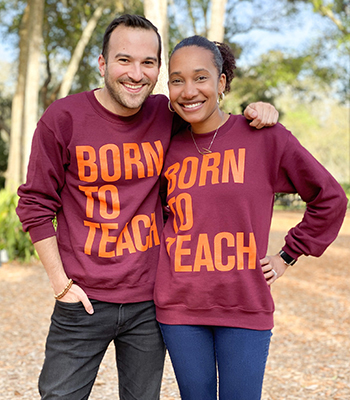 Chris Pombonyo ‘12 and co-teacher Nikhail Slaughter standing together