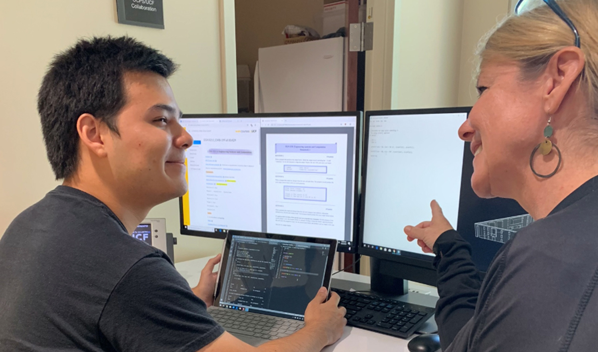 UCF student and Project Focus staff member meeting face-to-face during an initial assessment session.