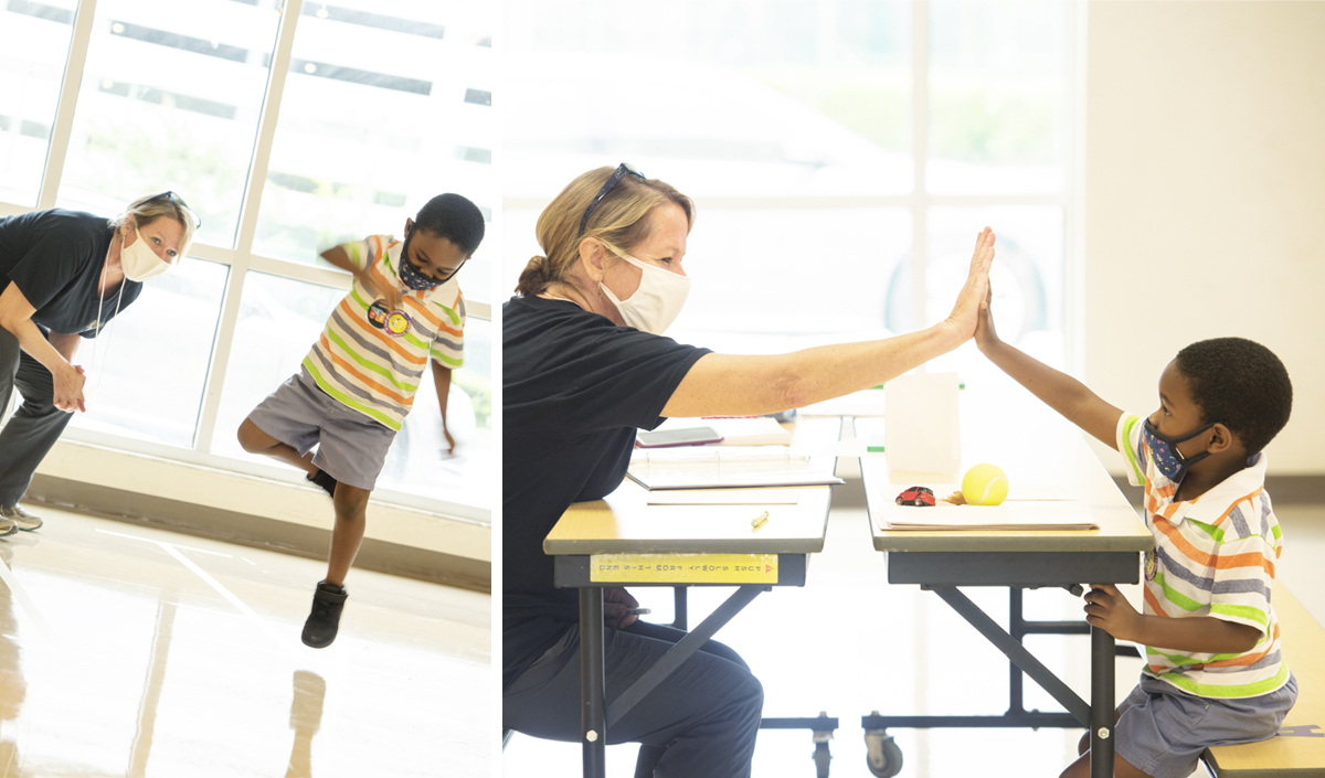 woman and child high-fiving