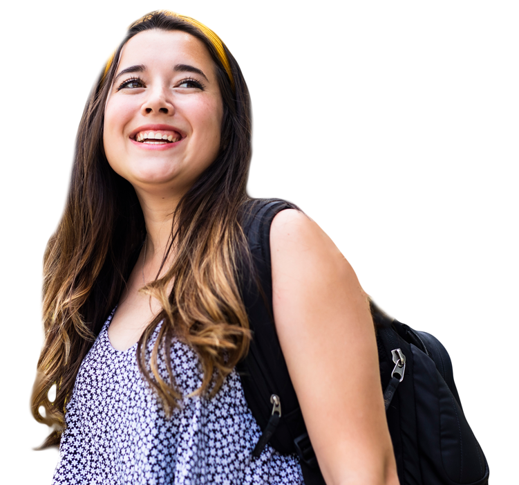 student smiling and carrying backpack