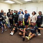 A group of students in UCF's Inclusive Education Services program incoming cohort pose together after a creative drama session during summer camp.