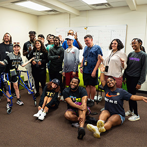A group of students in UCF's Inclusive Education Services program incoming cohort pose together after a creative drama session during summer camp.