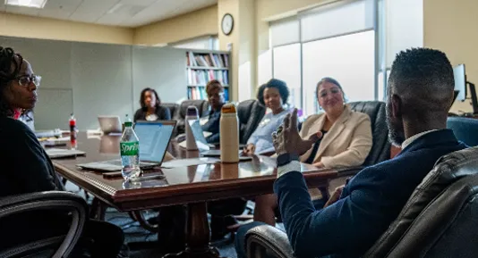 Group of people at conference table