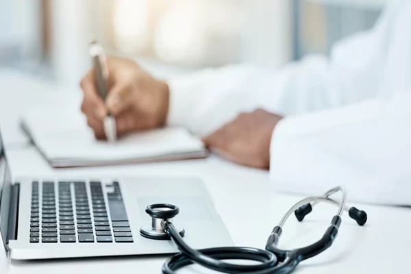 Stethoscope on laptop