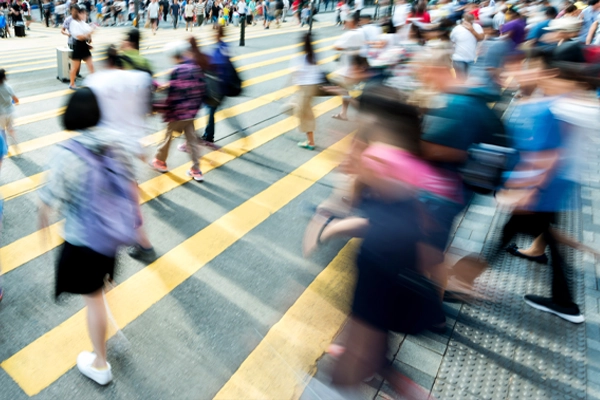 People walking the city in China with motion blur