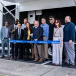 Orlando Mayor Buddy Dyer, reps from the City of Orlando and other project partners cutting ribbon