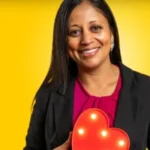 Sejal Barden holding lighted heart