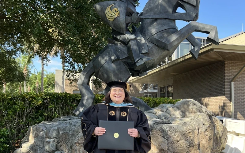 Newly minted UCF EdD graduate Sarah Hall ’14MEd ’25EdD is leading statewide efforts to improve literacy and empower educators across Florida. (Photo by CCIE Communications) Sarah Hall