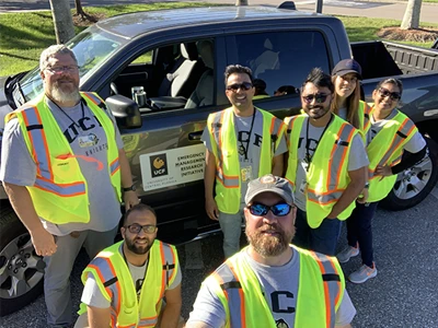 EMHS group of men in work vests