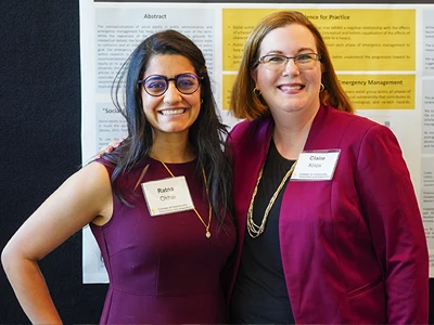 Dr. Claire Knox and student at Research event