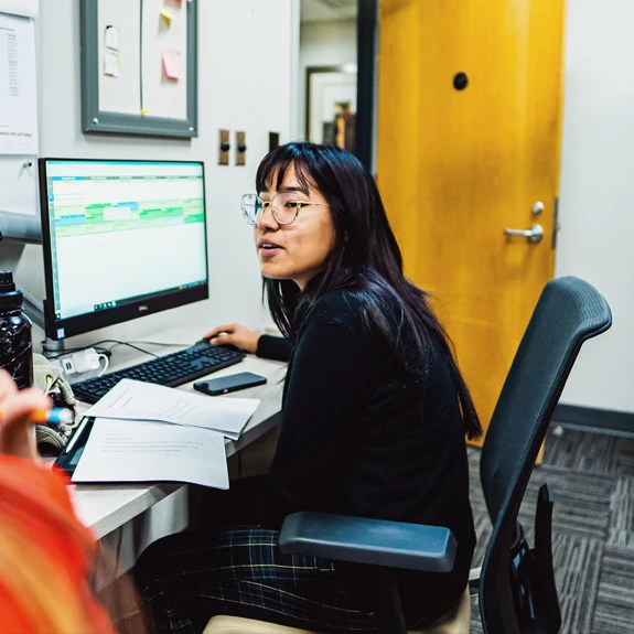 CCRC student working at desk