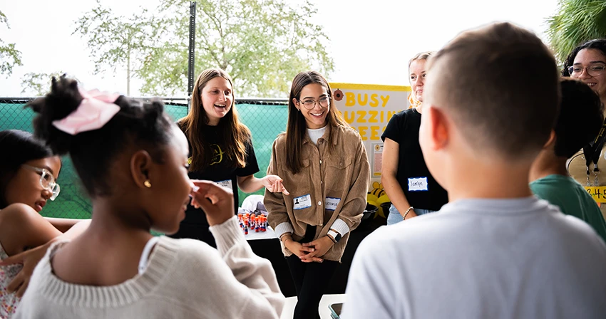UCF students teaching kids in the classroom