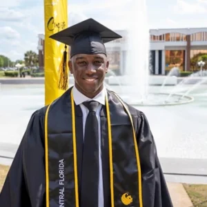 Latrell Sam-German in cap and gown