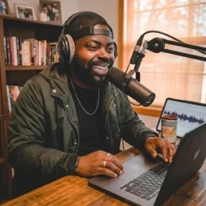 Mondeson Mondesir with microphone and laptop